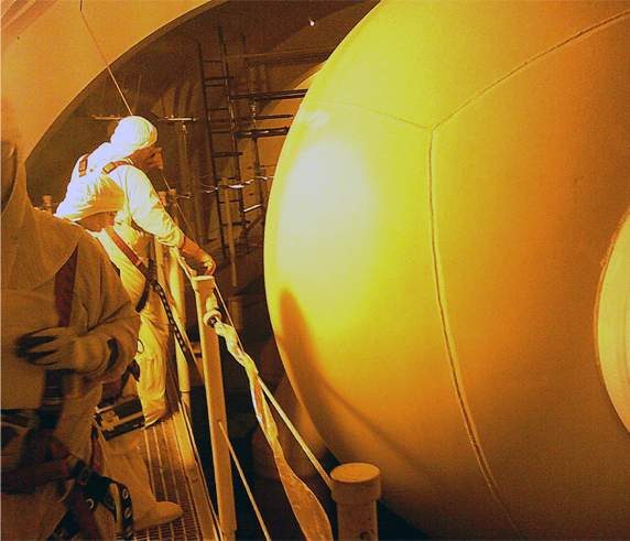 Technicians Assessing Condition of Nuclear Container